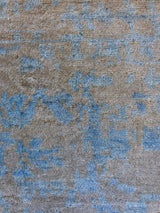 Beige and Turquoise Abstract Area Rug