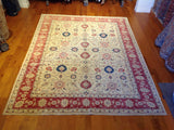 Traditional Rug with Red Border